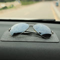 Small mesh non-slip car mat 18x13cm in grid colour on dashboard