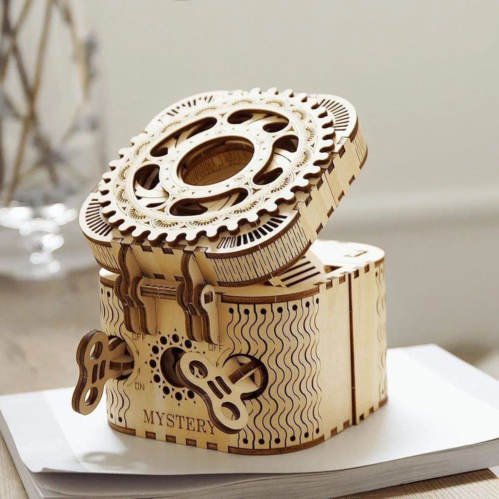 Wooden three-dimensional puzzle film projector with hand crank and gear wheel assembly