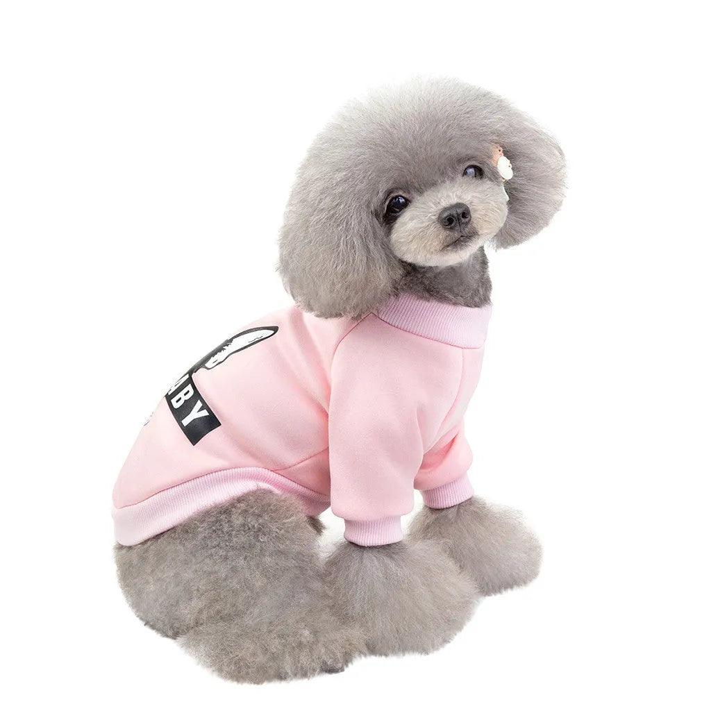 Cartoon fashion cotton dog sweater in pink, showing playful print and knit texture for small pets