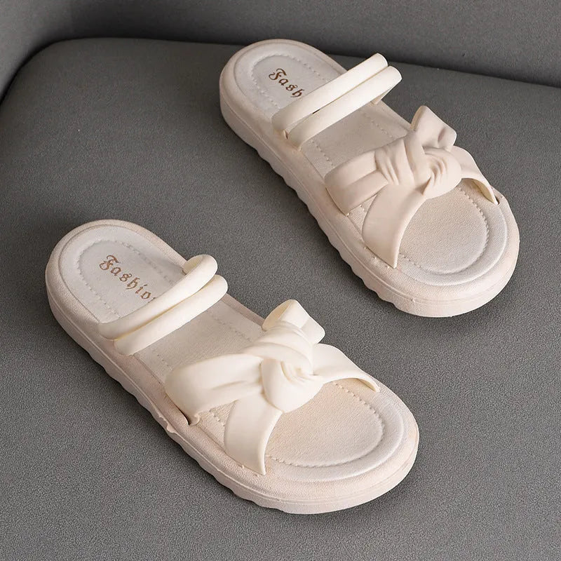 Women's black PVC outdoor sandals showing soft back thick back construction and two-way wear design