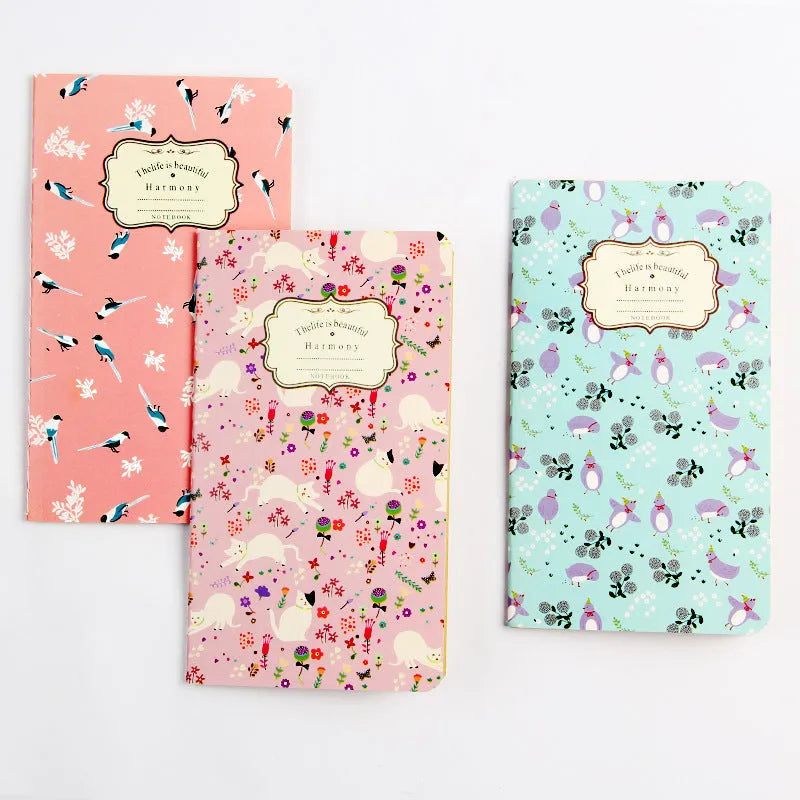 A5 kraft paper notebook with a hand-stitched binding and a hanging tassel bookmark in a natural design.