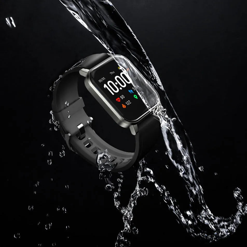 Black waterproof smart bracelet with touchscreen showing heart rate data on a silicone strap