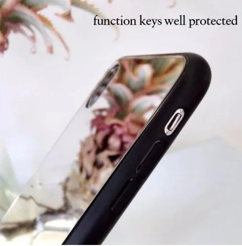 Black phone case for iPhone with a reflective mirror surface on the back.