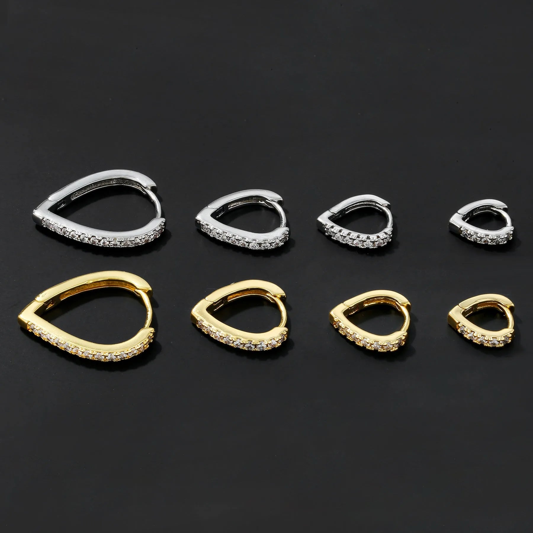 Geometric copper ear clip with love heart design in gold electroplated finish