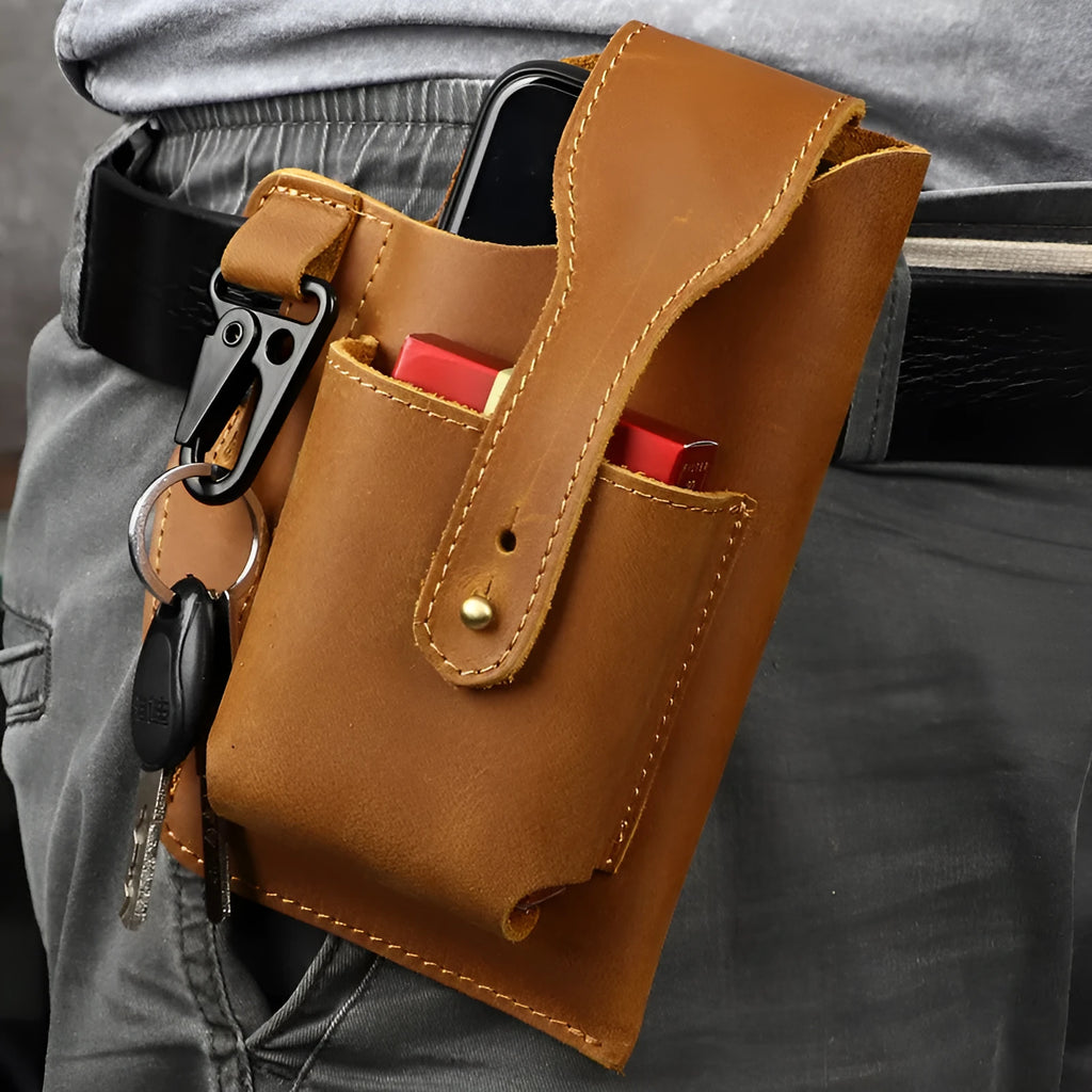 Men's brown leather hanging belt bag with car suture detailing and a flap closure