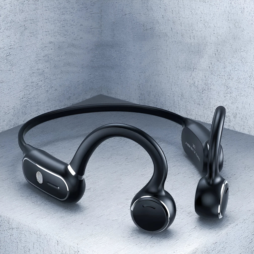 Black air conduction Bluetooth earphone with titanium wire frame shown bent for hanging