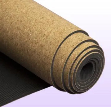 Natural cork and TPE yoga mat rolled out on floor, 5mm thick, 183x61cm, non-slip surface for yoga and pilates