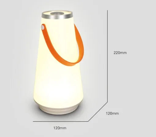 White rechargeable LED lantern night light on a wooden bedside table.