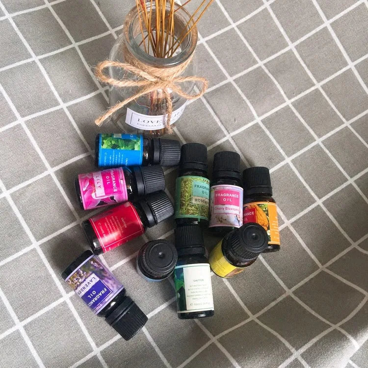 Set of 12 plant aromatherapy essential oil bottles with fragrances including Lavender, Lemon, and Mint for fresh air