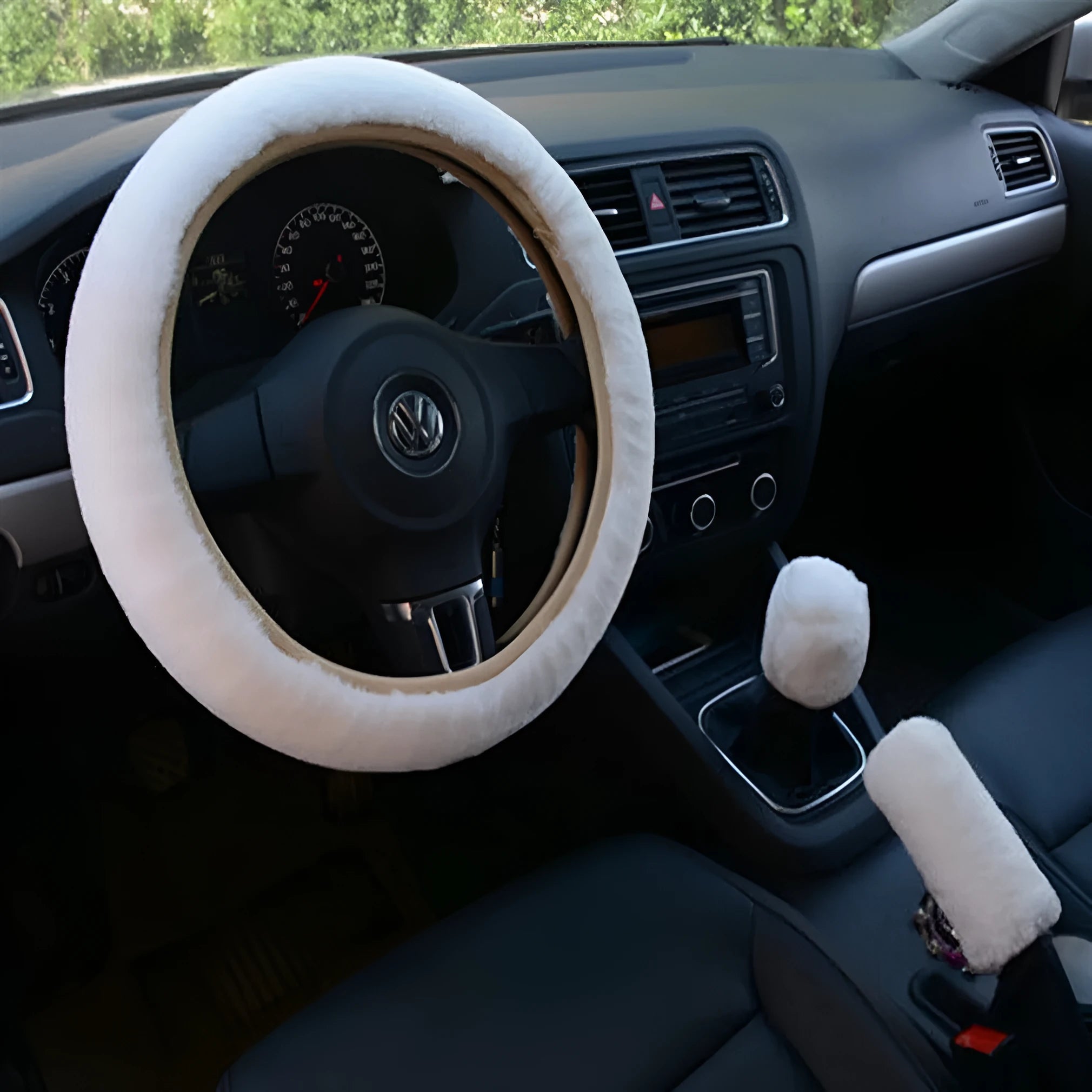 Plush car steering wheel cover set with matching handle sleeves and gear shift knob cover in beige colour