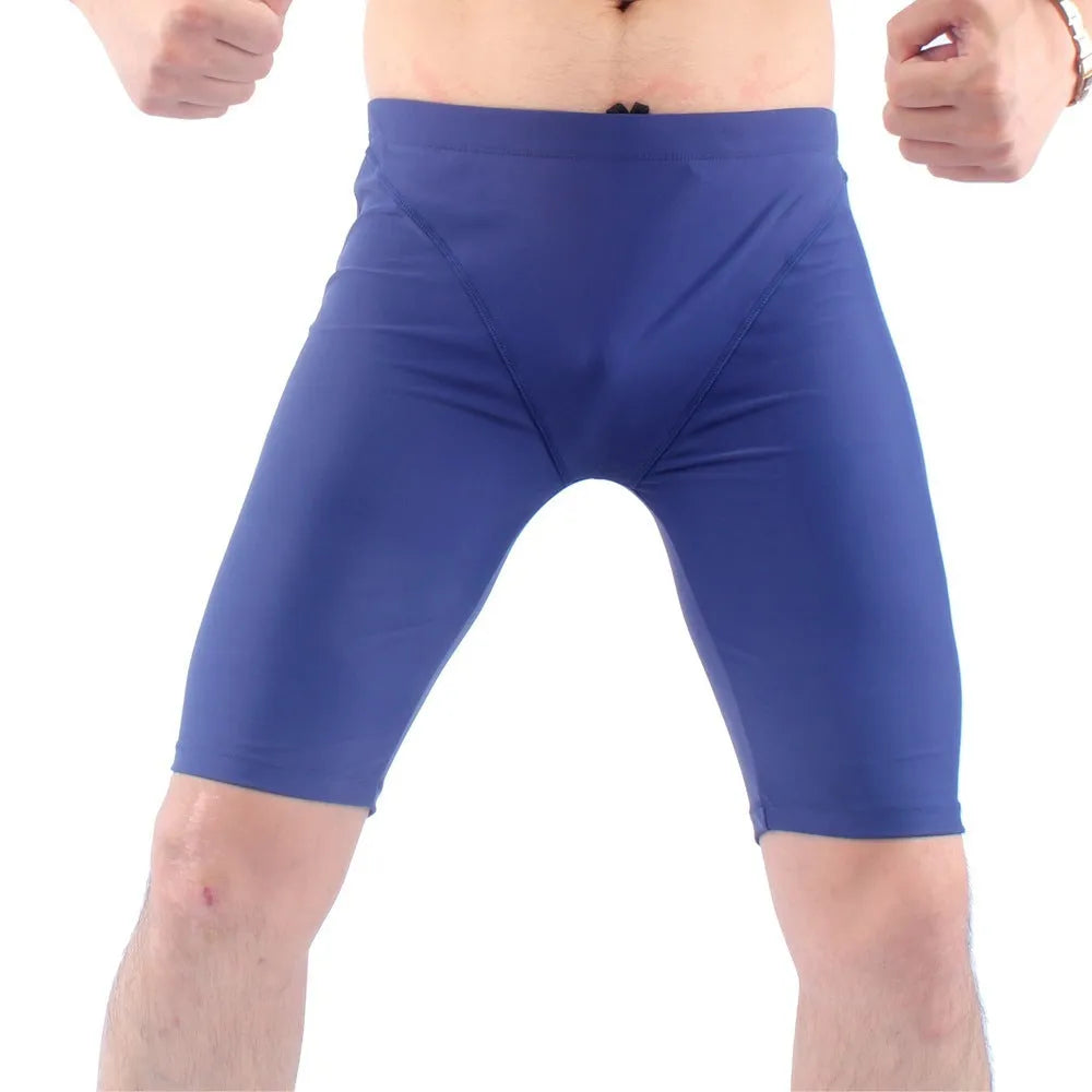 Men's quick-dry swimming trunks in green or navy blue available in extended sizes