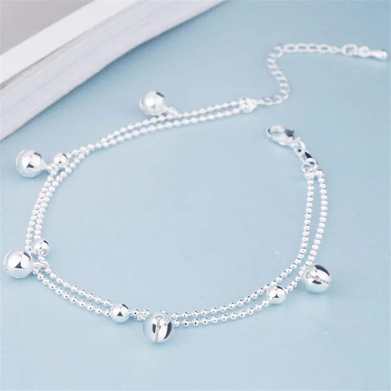 Silver plated bell anklet with geometric design, 16cm chain plus 3cm extension, copper base