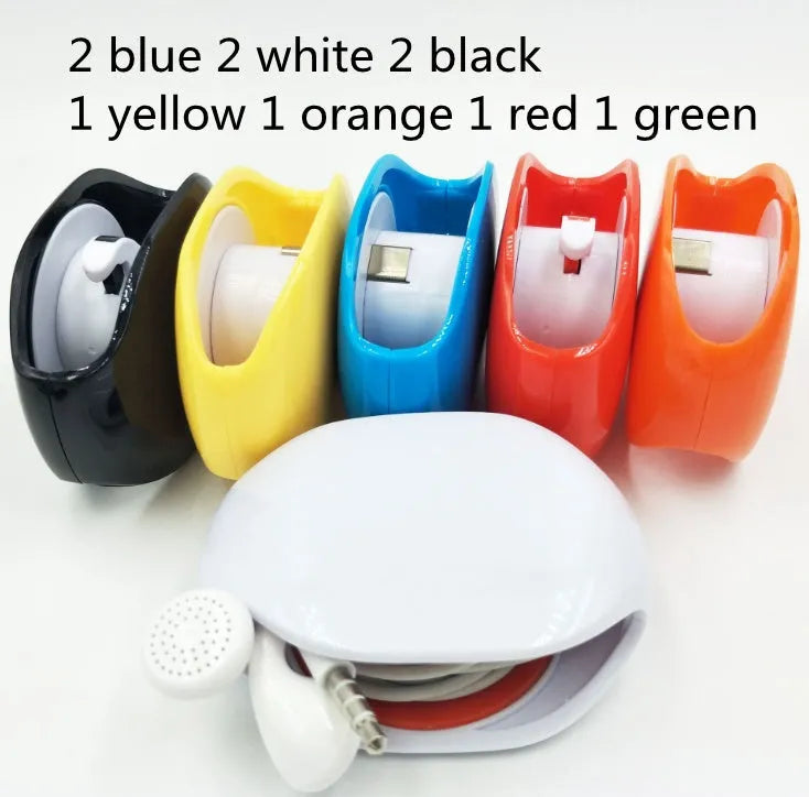 Automatic earphone cable retractor winder in multiple colours on a white background.