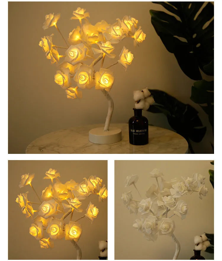 White and red rose flower shaped USB battery LED table lamp with warm white light on a table.