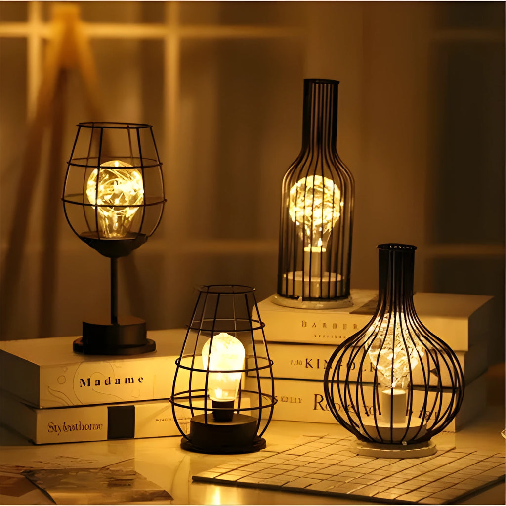 Minimalist hollow wrought iron table lamp with warm white LED light in decorative bottle style