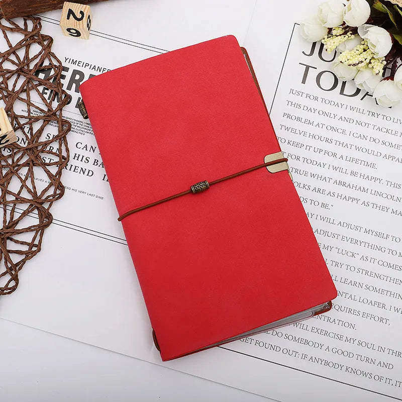 A6 diary notebook with cowhide rope design on imitation leather cover, showing wireless binding and available in grey, pink, or red colours
