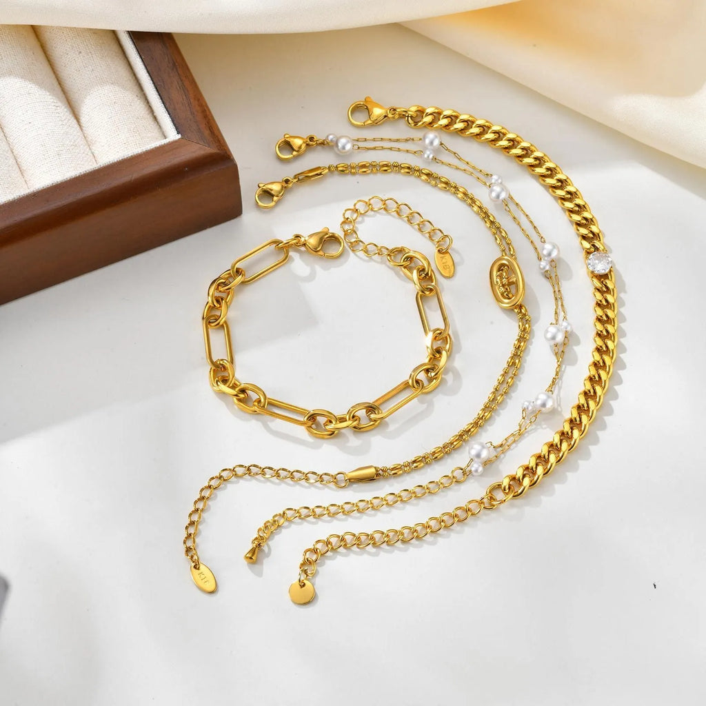 Women's titanium steel double-layer imitation pearl bracelet in geometric style with electroplated gold finish