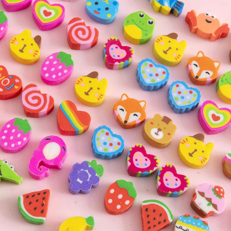 50 small colourful cartoon-themed TPR rubber erasers in a pearlescent film bag, themes include fruit, animal, and cake designs.