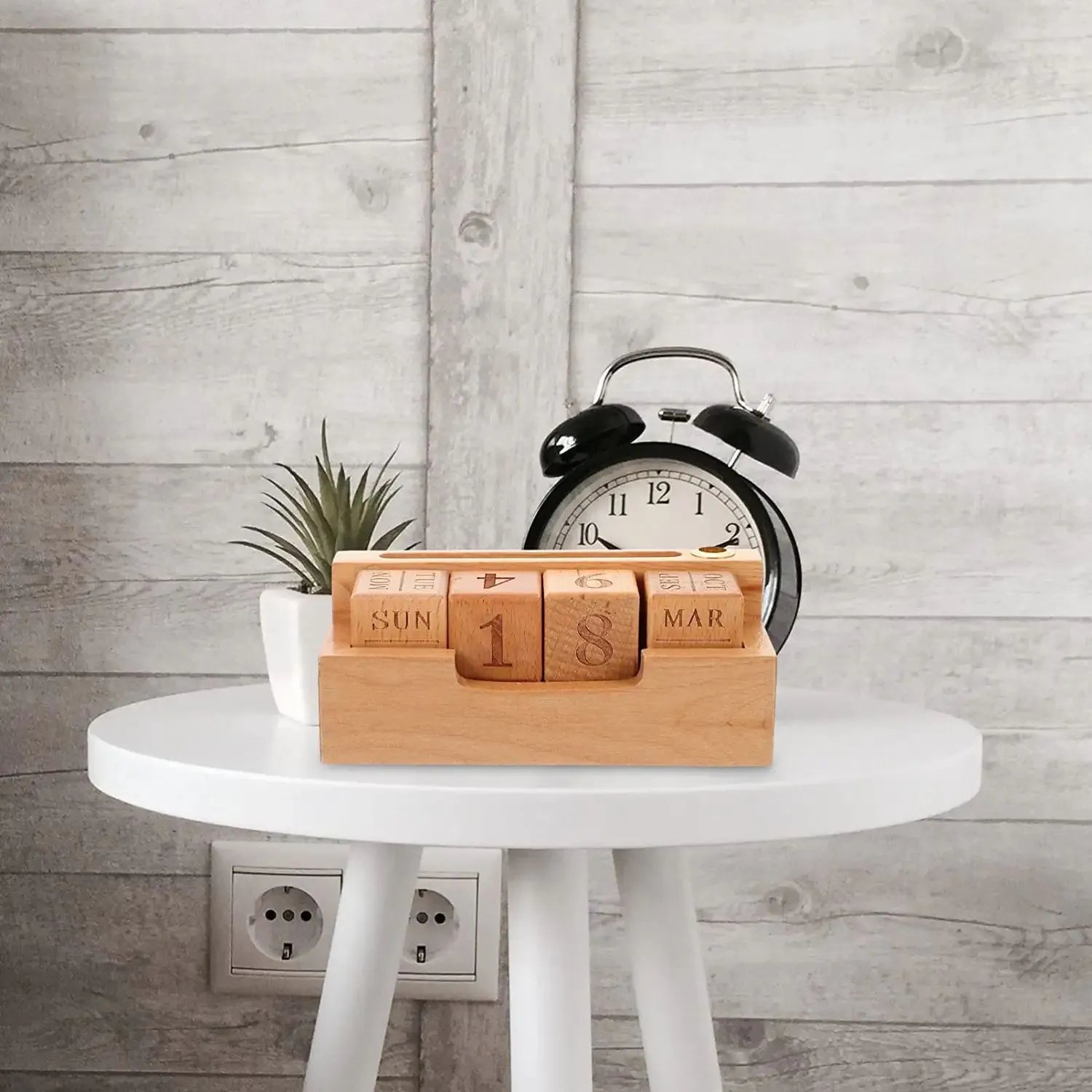 Solid wood minimalist desk calendar planner in natural finish showing day month and date display