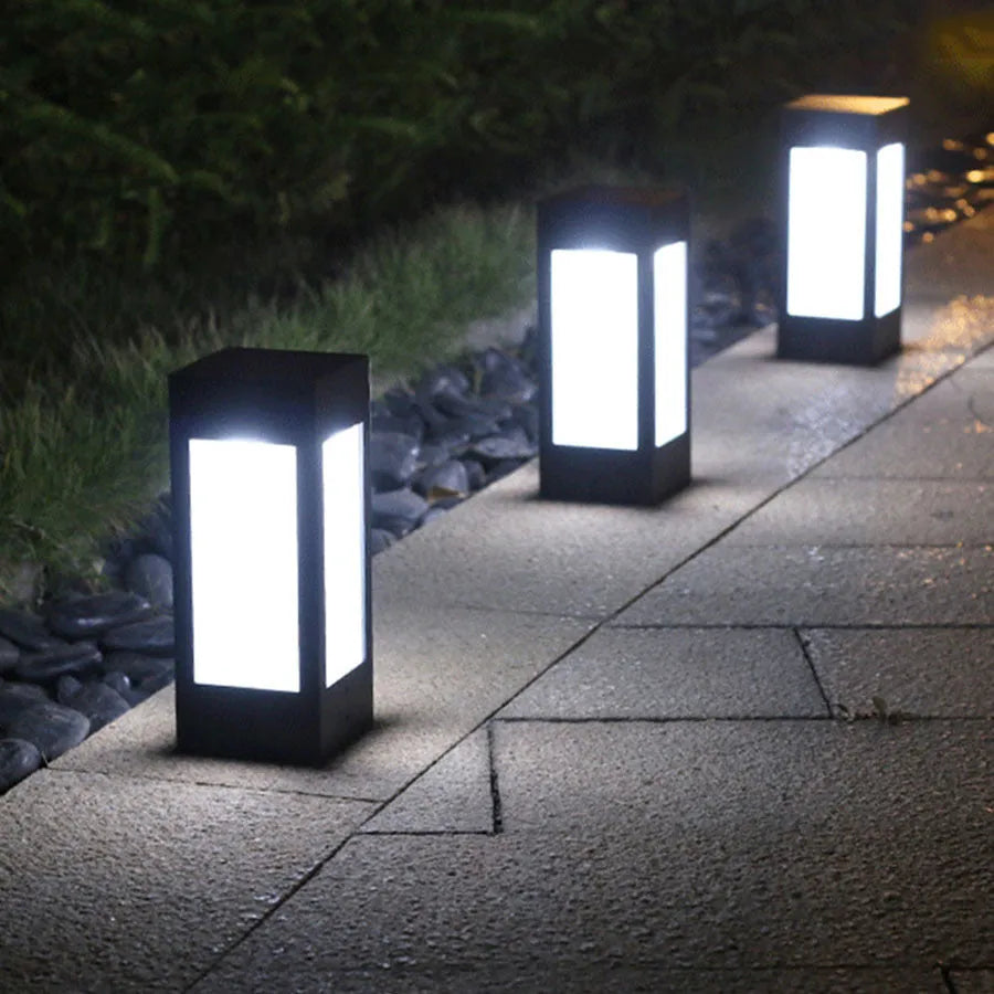 Set of solar-powered waterproof garden lights in various styles for outdoor use.