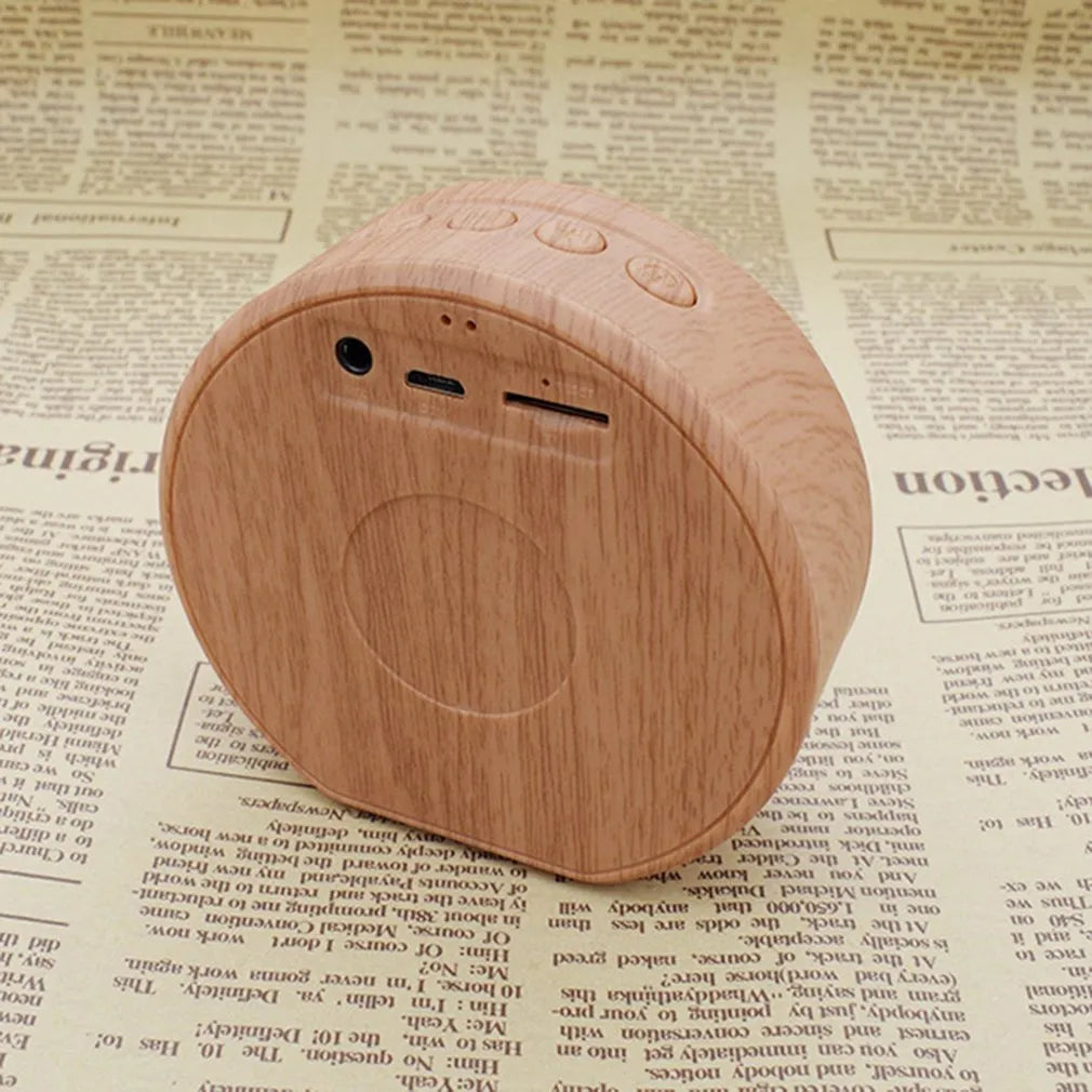 A60 wood grain wireless Bluetooth speaker in black with wood finish, 83x80x34 mm, 3W speaker
