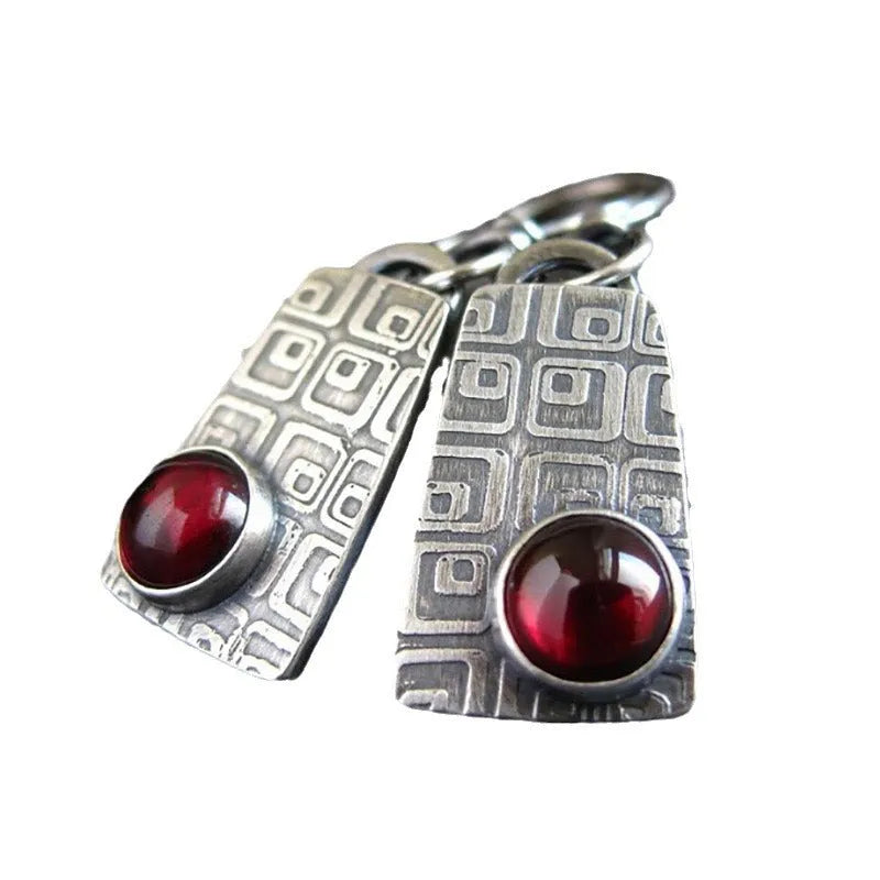 Retro geometric square pattern earrings with inlaid ruby and round element in silver alloy