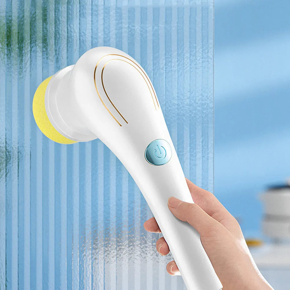 White cordless electric handheld cleaning brush with set of five different brush heads on a USB charging cable