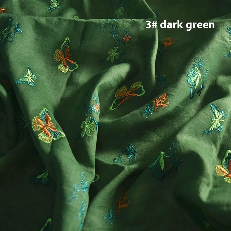 A piece of pure ramie fabric in a choice of beige, grass green, or dark green, shown with a ruler indicating its 140cm width.