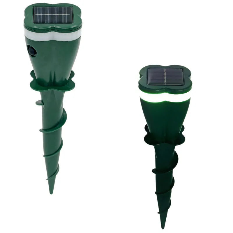 Outdoor solar energy rat and snake repellent spiral inserted in garden soil