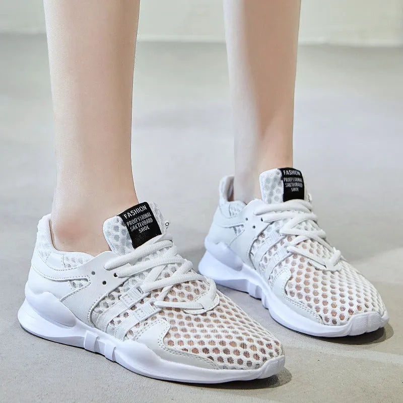 Breathable hollow out mesh casual sneakers in black and white colours with round toe design