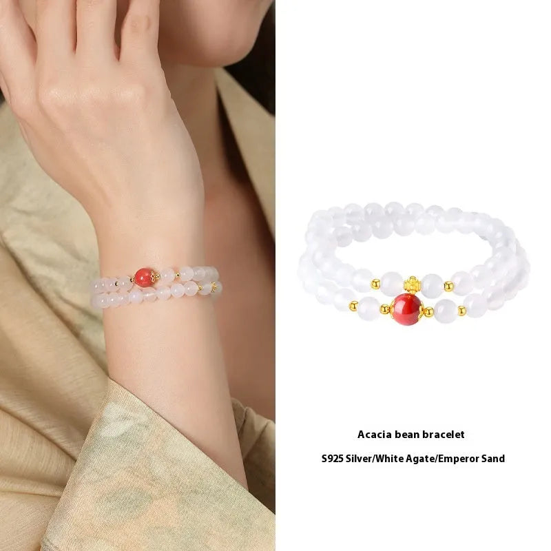 White agate women's bracelet with geometric double layer design featuring jequirity bean and cinnabar accents