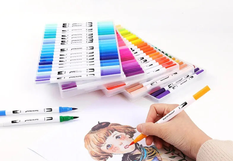 Set of watercolour brush pens in multiple colours with brush tips, arranged in a case.