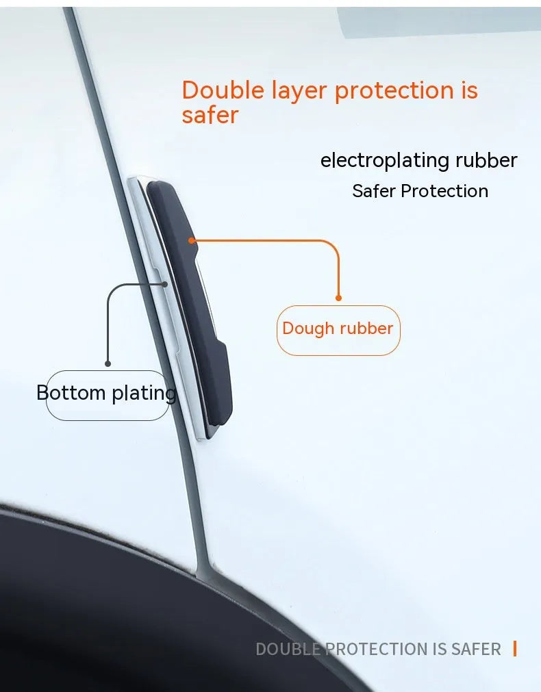 Four black plastic silicone car door protector strips measuring 9.5cm by 2cm