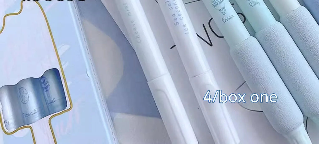 Four double-headed fluorescent calligraphy pens with 0.5mm tips for student practice.