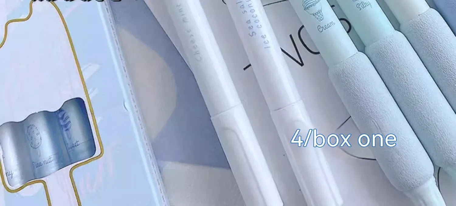 Four double-headed fluorescent calligraphy pens with 0.5mm tips for student practice.