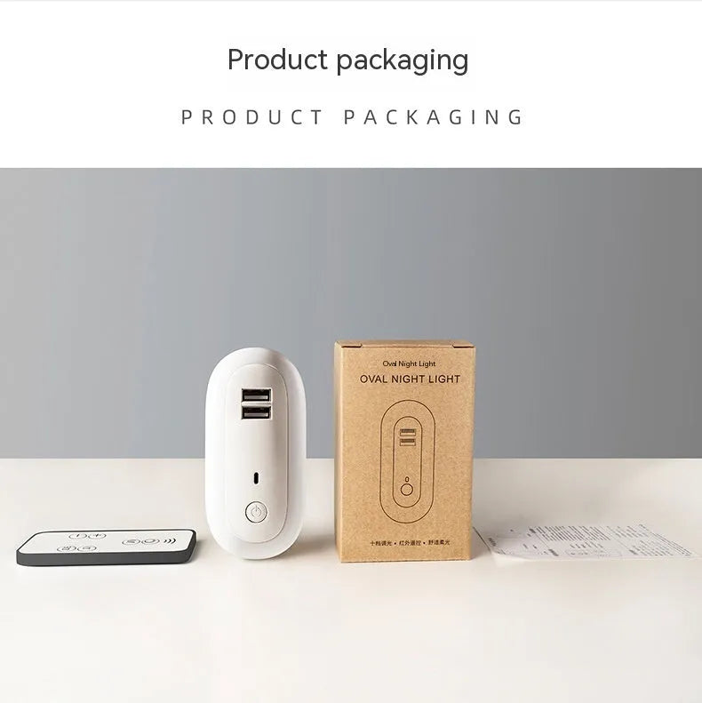 Oval small night light with dual USB charging ports and remote control, 1W LED wall plug-in lamp