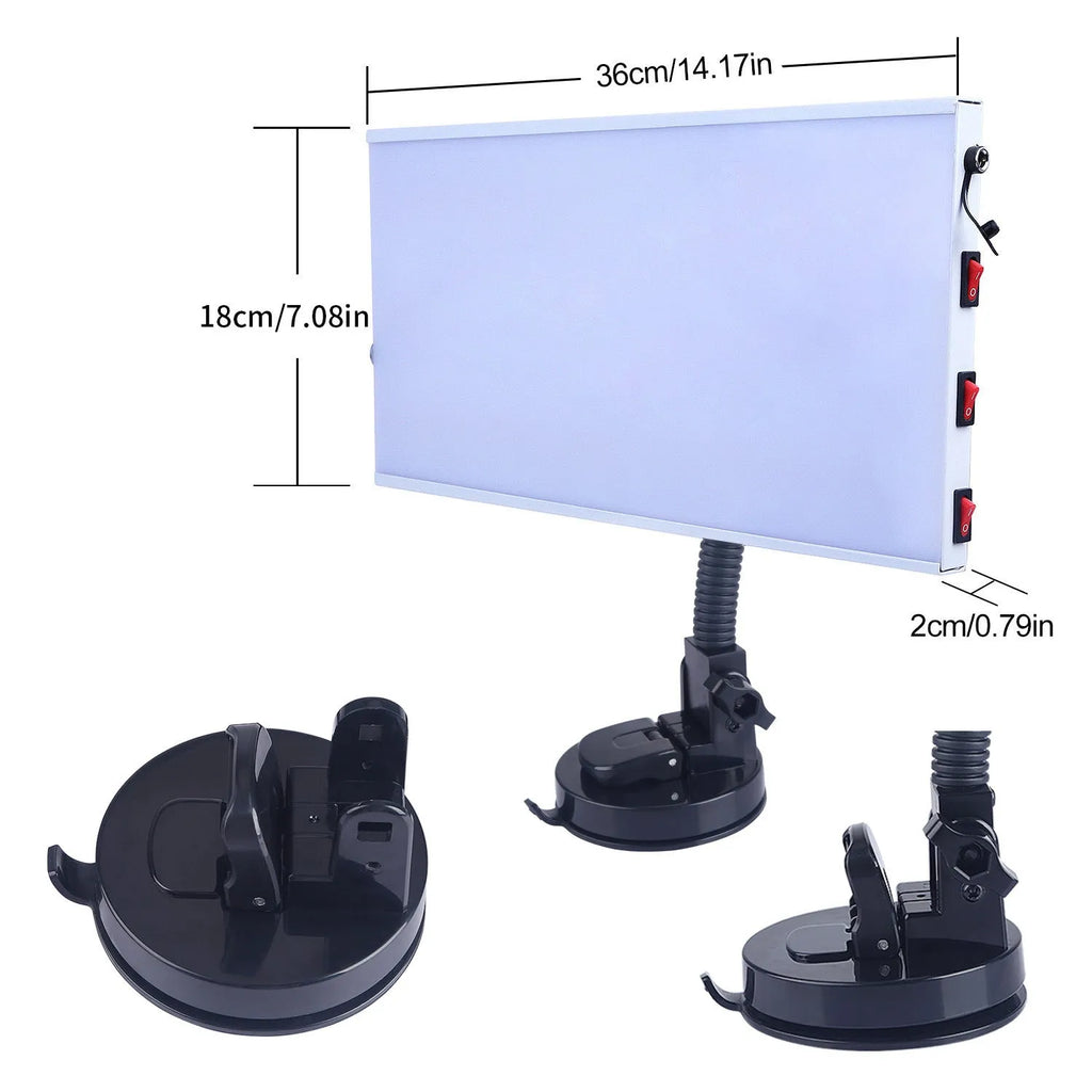 White car dent repair detector kit with concave inspection light on workshop bench