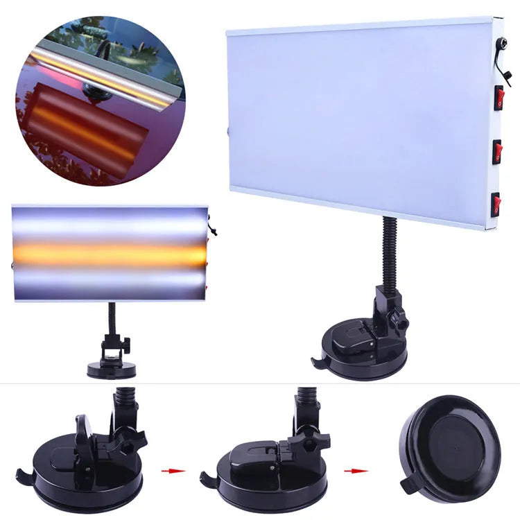 White car dent repair detector kit with concave inspection light on workshop bench
