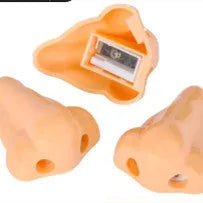 Flesh colour plastic manual pencil sharpener with big nostril hole on geometric body.