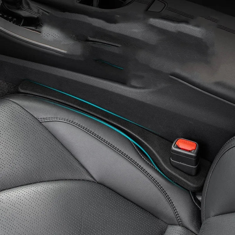 Car seat gap sealing strips in four colours showing waterproof polyresin construction and handle