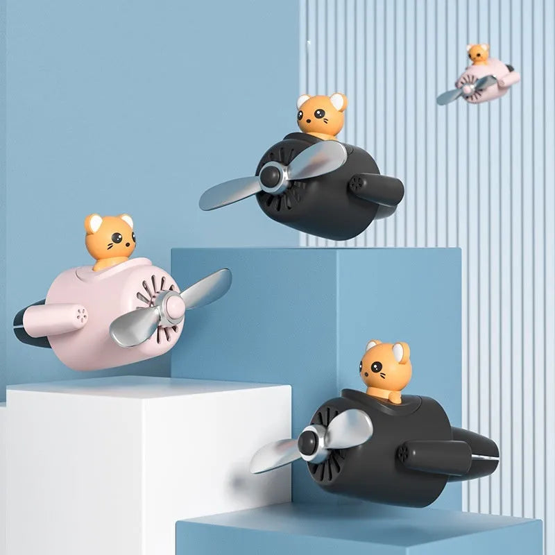 Cartoon-style small plastic airplane car air vent aromatherapy diffuser.