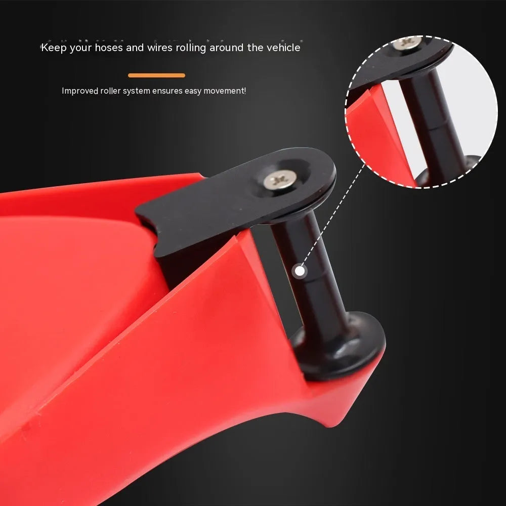 Four red plastic triangular car parking blocks with non-slip rubber surfaces for tyre security