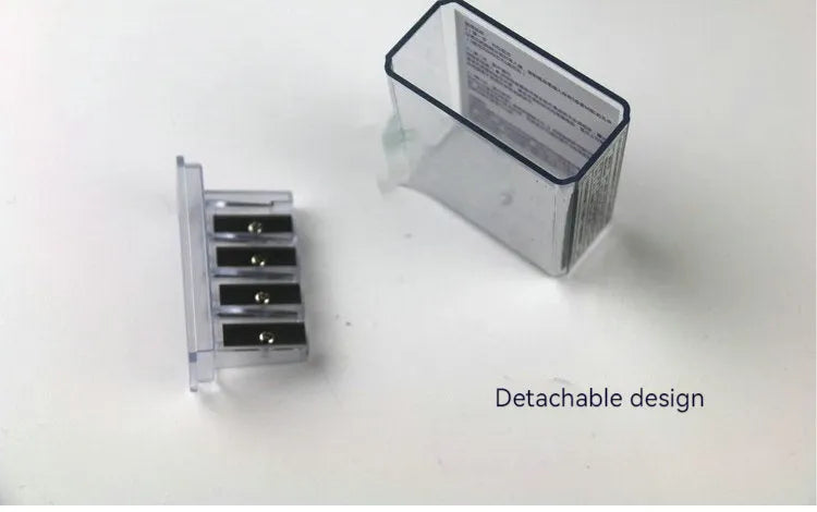 Four hole geometric pencil sharpener with plastic construction and maintenance screwdriver