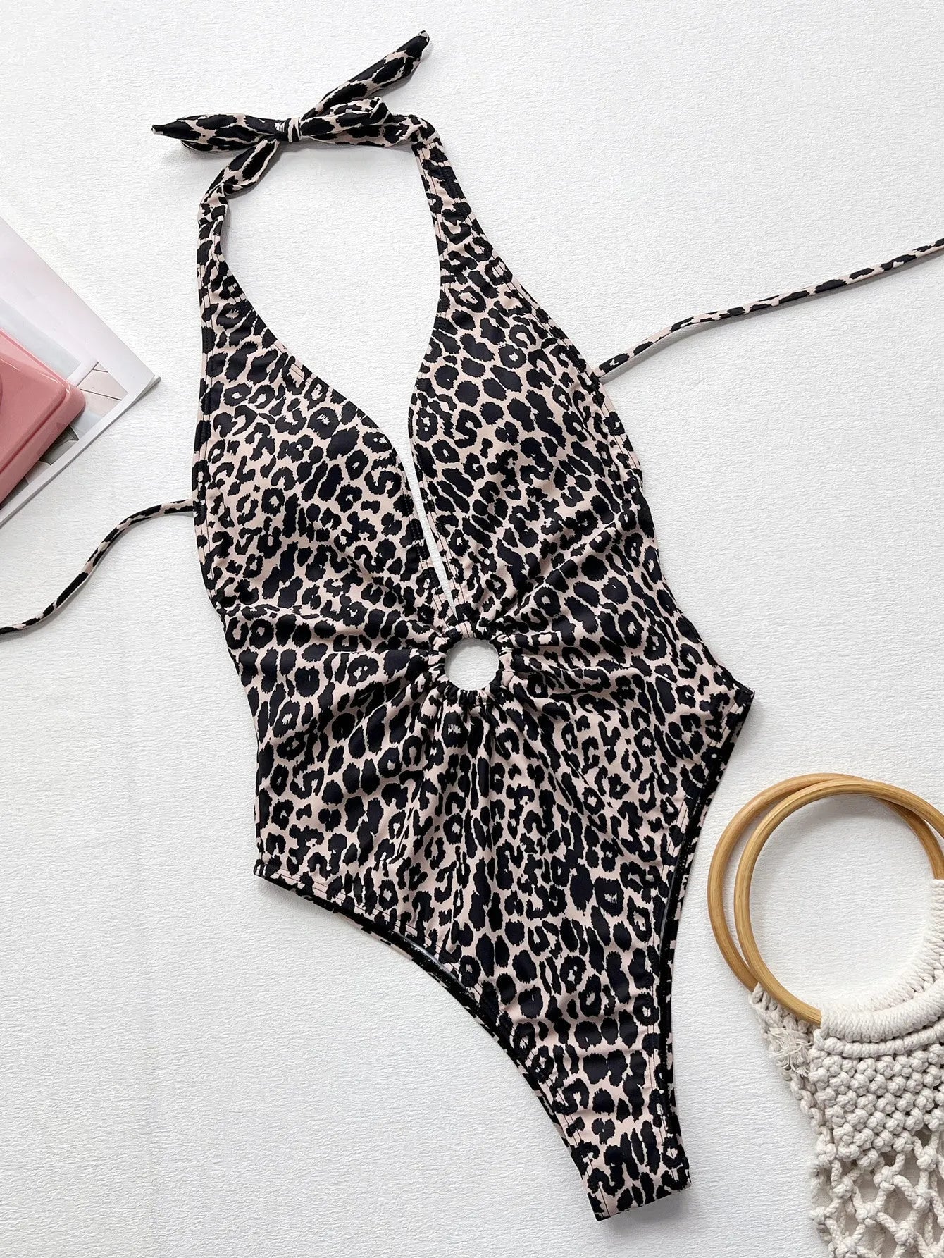 Leopard print one-piece swimsuit with hollow-out ring detail for women in sizes S, M, L.
