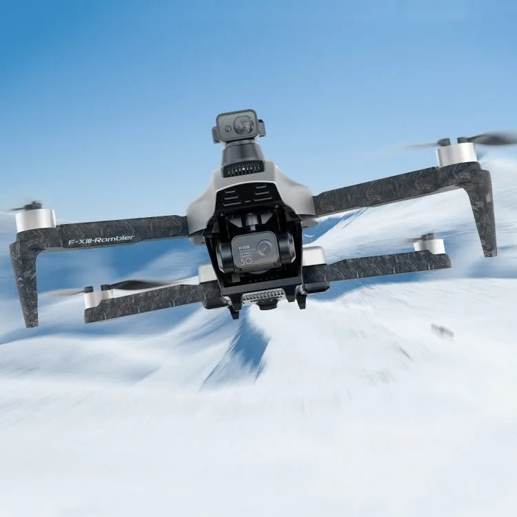 White folding quadcopter drone with camera, shown with remote control and shoulder bag.