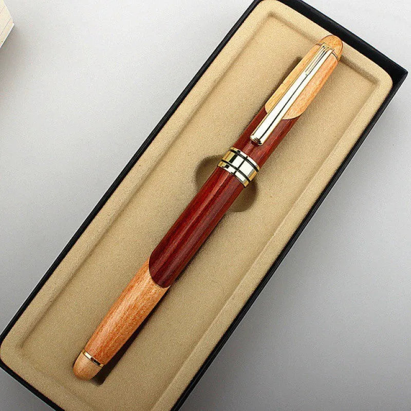 Wooden barrel and metal body pen with a grey fabric storage bag.