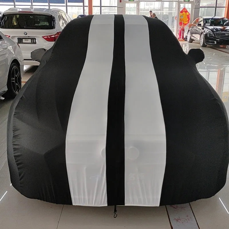 Ford Mustang elastic car cover in light grey colour stretched over vehicle showing four-side elastic edges