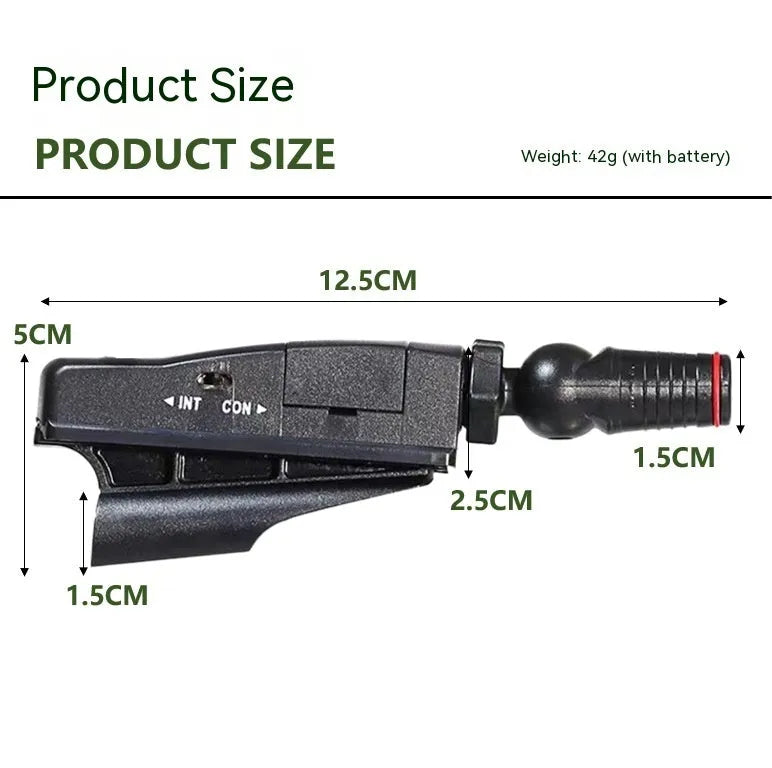Golf putter laser aiming instrument showing laser dot alignment on a practice green.