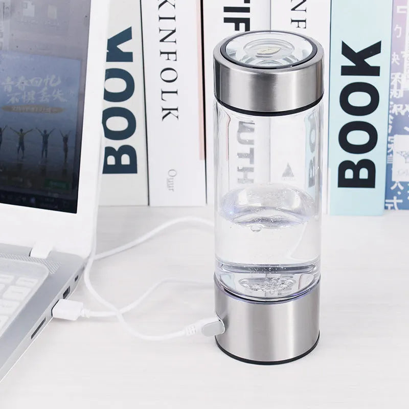 Silver hydrogen water bottle with electric generator and borosilicate glass construction
