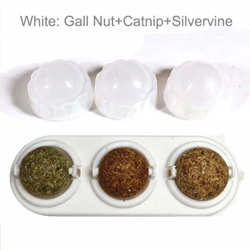 Self-adhesive rotated catnip lick ball for cats in blue, green, pink, white, mint, red colours with natural ingredients